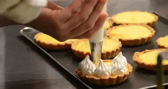 Freshly baked croissants and macarons